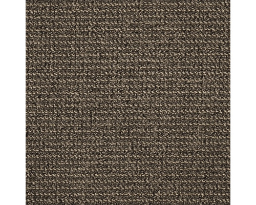 Gros plan d'un tapis brun à boucles