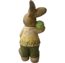 Figurine de lapin de Pâques avec un œuf comme décoration
