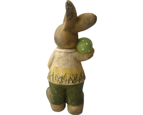 Figurine de lapin de Pâques avec un œuf comme décoration