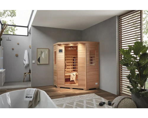 Eck-Infrarotsauna aus Holz in einem Badezimmer mit Badewanne