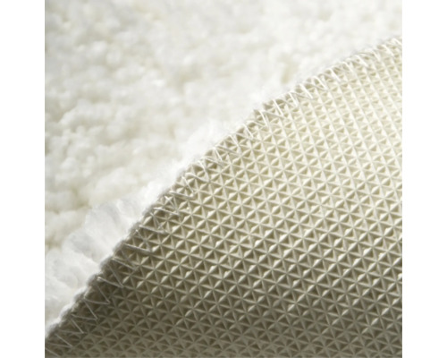 Detailansicht eines Teppichs mit rutschfester Unterseite