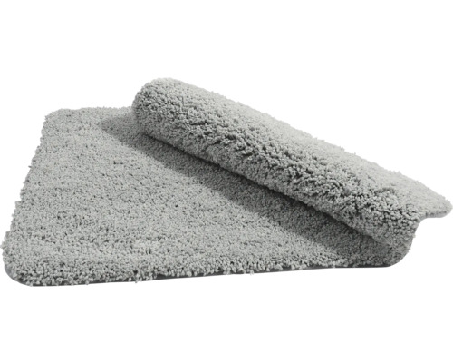 Tapis de bain gris enroulé