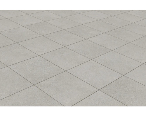 Sol carrelé avec carreaux carrés et joints