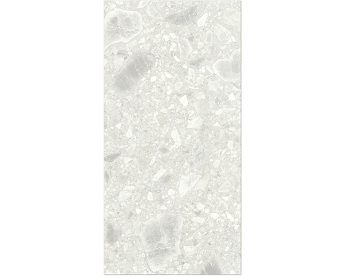 Gros plan d'un carreau de sol à l'aspect terrazzo