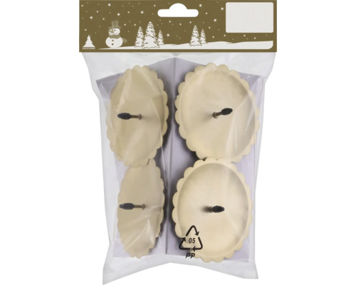 Quatre bougeoirs en métal dans un emballage