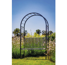 Banc de jardin avec arche de roses dans le jardin