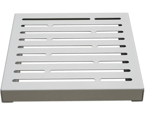 Étagère de douche carrée avec fentes.