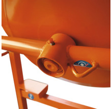 Detailansicht einer Betonmischmaschine, die die Mechanik und das Mischwerk zeigt.