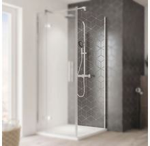 Cabine de douche avec robinetterie de douche et carreaux géométriques