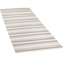 Tapis rayé beige et blanc.