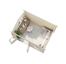 Vue intérieure d'une cabane de jardin en bois avec coin bureau et couchage