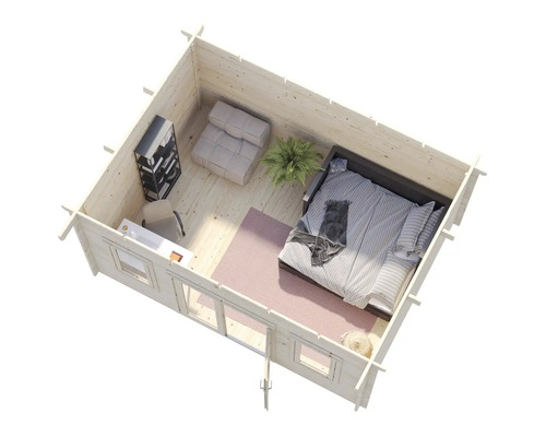 Vue intérieure d'une maison en bois avec lit, fauteuil, bureau et étagères