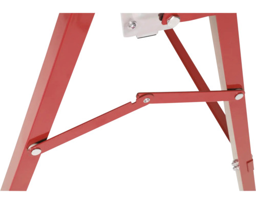 Détail d'une plateforme de travail rouge avec des connexions métalliques