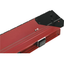 Vue détaillée d'une carrelette avec base rouge et élément noir