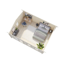 Vue intérieure d'un abri de jardin avec chambre et espace de travail