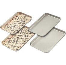 Quatre barquettes pour grill, deux avec des symboles de barbecue et deux sans, en métal