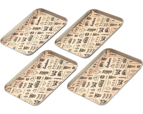 Quatre barquettes de grill avec du papier cuisson pour grillades