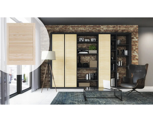 Scène d'un salon avec une grande bibliothèque à portes coulissantes et un élément de porte coulissante séparé