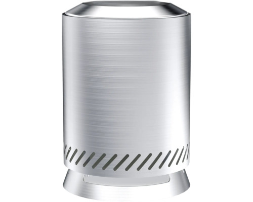 Silberfarbener Tischkamin mit Aussparungen am Sockel