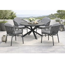 Gartensitzgruppe mit rundem Tisch und vier Stühlen mit Kissen auf einer Terrasse