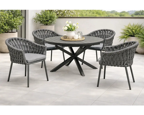 Gartenmöbelset mit rundem Tisch und vier Stühlen auf einer Terrasse.