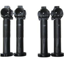 Lot de quatre pieds de meuble réglables en plastique noir pour armoires de cuisine.