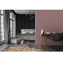 Aménagement d'une pièce avec un lit, un bureau et des décorations dans un style moderne.