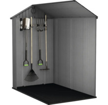 Abri de jardin avec outils de jardin au mur