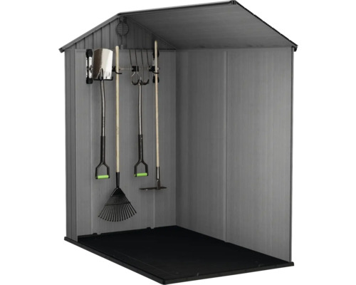 Abri de jardin avec outils de jardin au mur