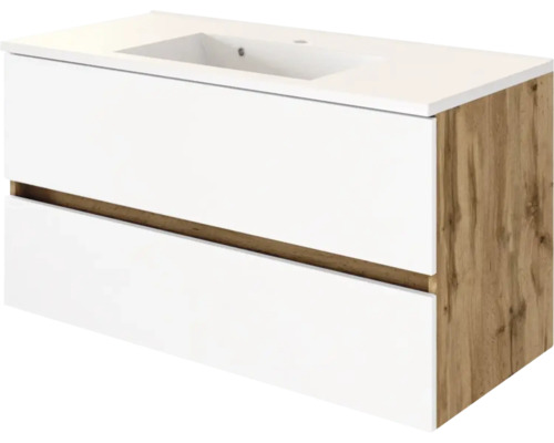 Moderner Waschtischunterschrank mit integriertem Waschbecken, zwei Schubladen mit Griffmulden, weiße Front und Seitenwand in Eichenoptik.