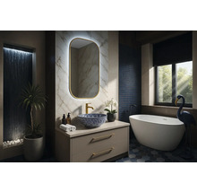 Salle de bain moderne avec meuble-lavabo, miroir, baignoire et décoration