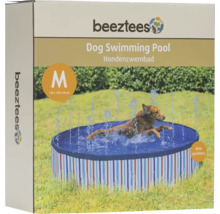 Emballage beeztees avec logo, sur lequel un chien nage dans une piscine pour chiens avec arroseurs