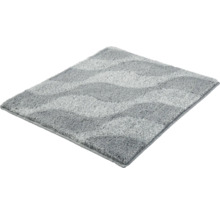 Grauer Badteppich mit Wellenmuster aus weicher Kunstfaser.