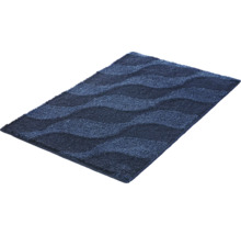 Blaue Badematte mit Wellenmuster und weicher Oberfläche.