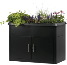 Bac à fleurs surélevé en métal noir avec armoire basse intégrée verrouillable et plantations.