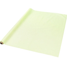 Chemin de table vert clair sur un rouleau en carton.