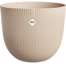 Cache-pot rond elho en plastique avec structure ondulée verticale en beige.