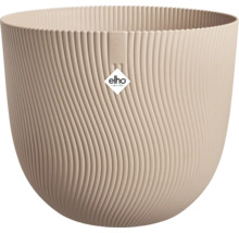 Pot de fleurs rond beige Elho avec une structure de surface verticale ondulée en plastique.