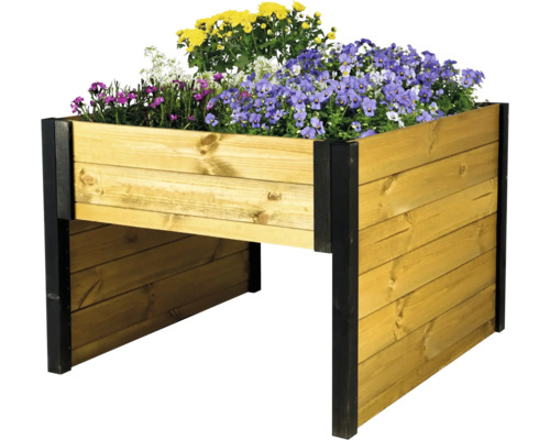 Carré potager surélevé en bois avec poteaux d angle noirs et fleurs.