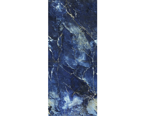 Carreau aspect marbre bleu foncé avec veinage blanc et doré.