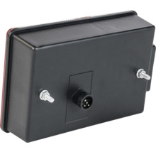 Vue arrière d un feu arrière de remorque avec deux boulons de montage et un connecteur à cinq broches.