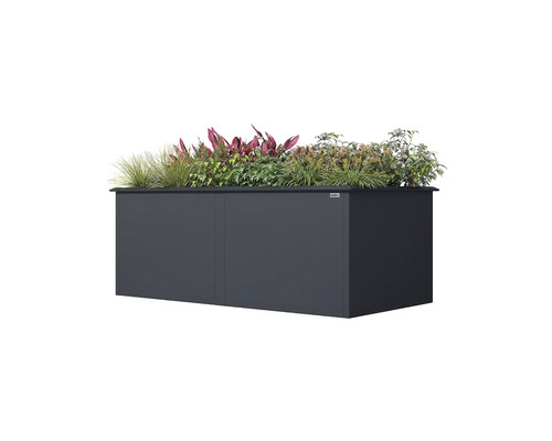 Carré potager surélevé rectangulaire Weka en bois anthracite, planté de diverses herbes et plantes de jardin.