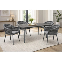 Modernes Gartenmöbel-Set mit anthrazitfarbenem Tisch und vier Stühlen mit grauer Seilverflechtung und Sitzkissen in einem hellen Raum.