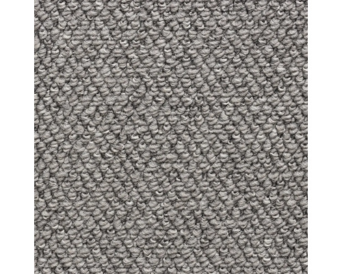 Gros plan d'une moquette grise avec une structure bouclée dense.