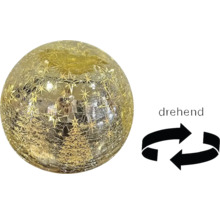 Boule en verre rotative avec motifs de sapins et d'étoiles et effet craquelé.