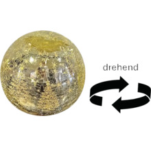 Boule de Noël rotative dorée en verre avec motifs de sapins et d'étoiles.