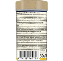 Dos d'une boîte de nourriture pour poissons tropicaux dès environ 1 centimètre, avec ingrédients, nutrition, code-barres et poids de 30 grammes.