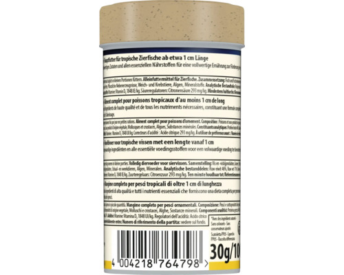 Dos d'une boîte de nourriture pour poissons tropicaux dès environ 1 centimètre, avec ingrédients, nutrition, code-barres et poids de 30 grammes.