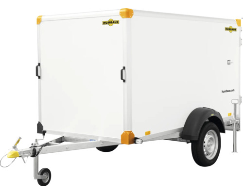 Remorque fourgon Humbaur blanche avec essieu simple, roue jockey et porte latérale.