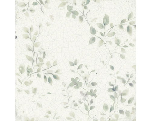 Carreau mural avec motif floral de feuilles et effet craquelé de style vintage.